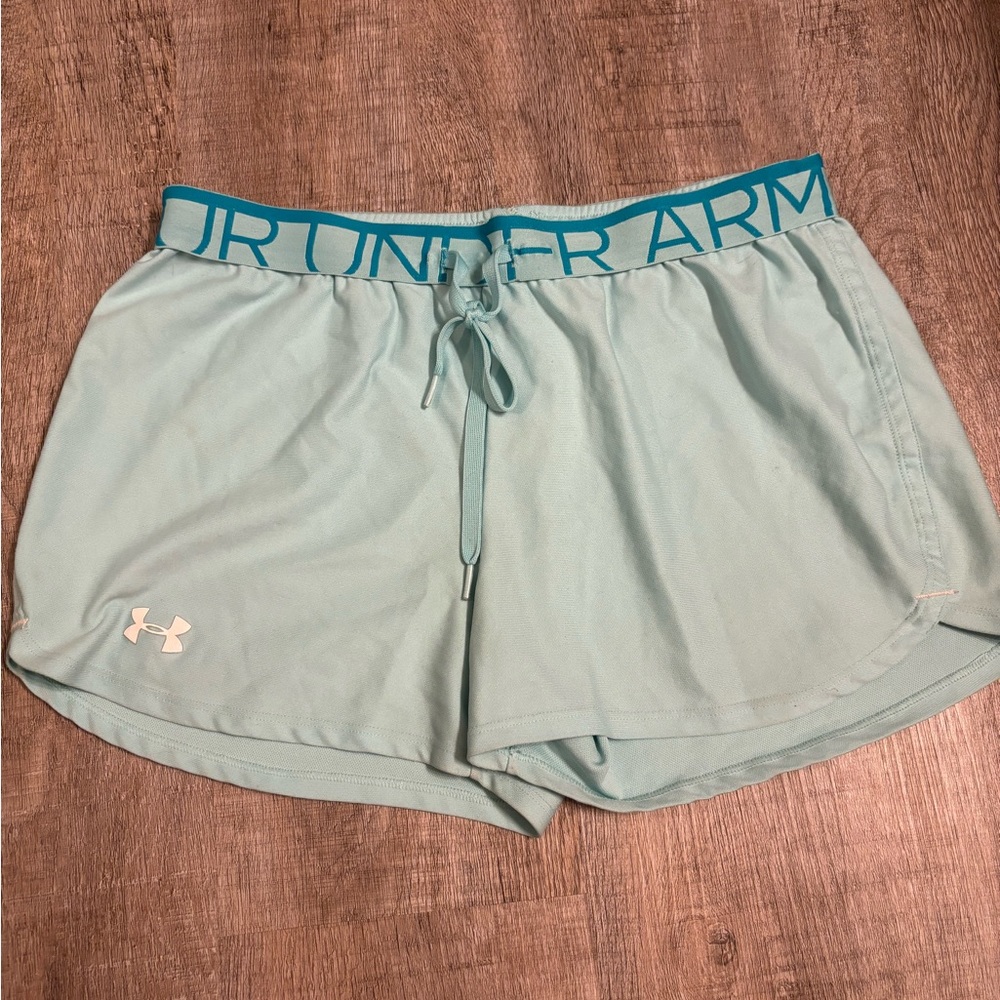 Light blue Under Armour running shorts